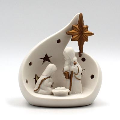 White and gold ceramic nativity