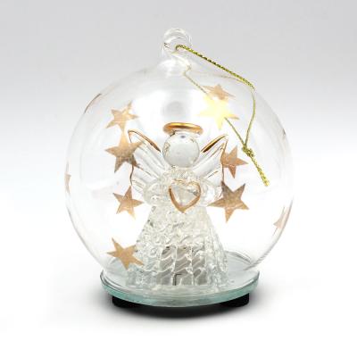 Ange dans boule en verre