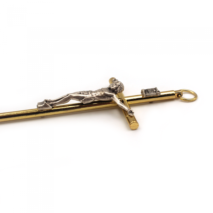 Fine croix en métal doré